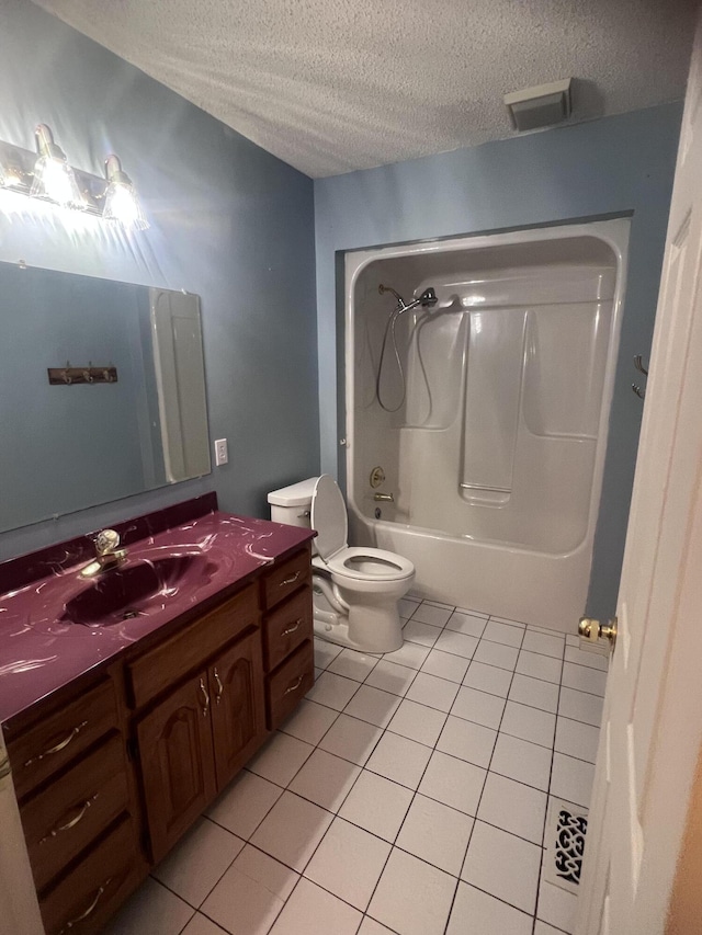 bathroom with vanity, a textured ceiling, shower / bath combination, tile patterned floors, and toilet