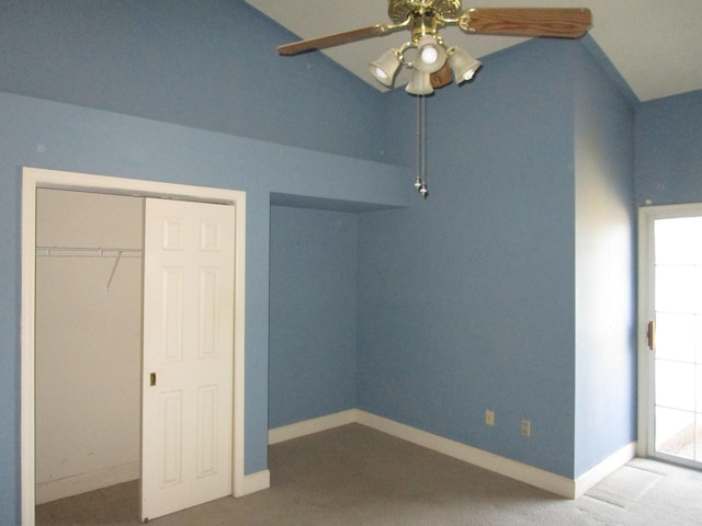 unfurnished bedroom with baseboards, multiple windows, a closet, and carpet flooring