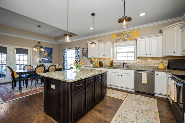 kitchen featuring stainless steel dishwasher, dark wood-style floors, white cabinetry, and electric range oven