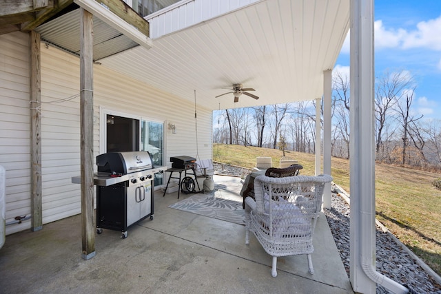 view of patio featuring grilling area and a ceiling fan