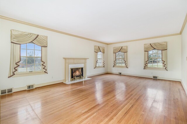 2136 Adena Ln, Lexington, KY 40516 - unfurnished living room with wood finished floors, visible vents, and baseboards