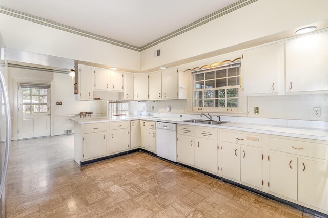 2136 Adena Ln, Lexington, KY 40516 - kitchen featuring a sink, light countertops, visible vents, and white dishwasher