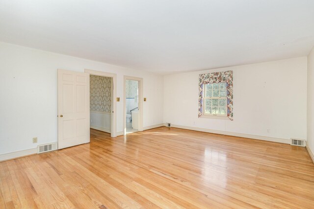 2136 Adena Ln, Lexington, KY 40516 - unfurnished room with baseboards, visible vents, and light wood finished floors