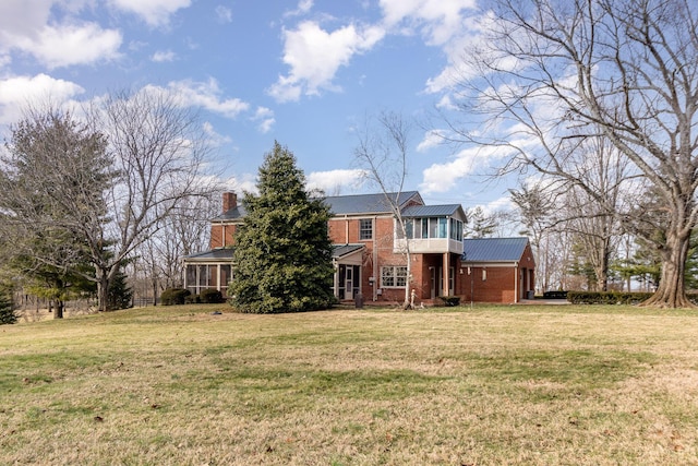 2136 Adena Ln, Lexington, KY 40516 - back of property with brick siding and a lawn