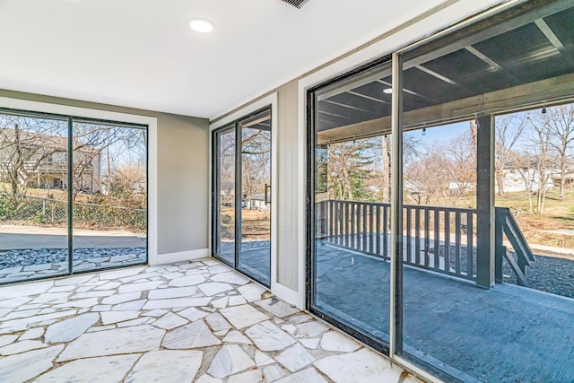 view of unfurnished sunroom