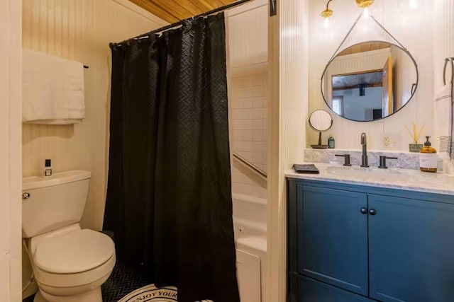 full bathroom featuring shower / tub combo, toilet, and vanity