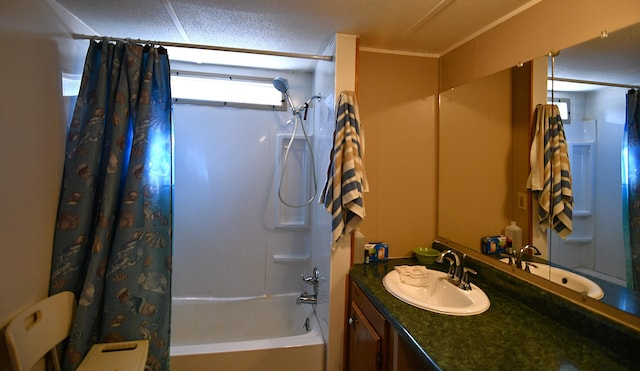 bathroom featuring shower / bath combo with shower curtain and vanity