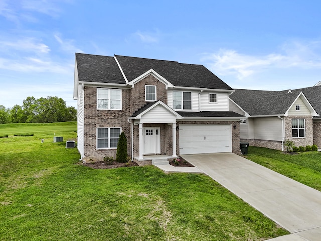 407 General John Payne Blvd, Georgetown, KY 40324 - traditional-style house with a garage, concrete driveway, a front yard, and brick siding
