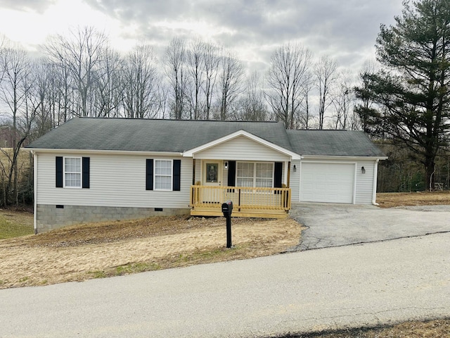 single story home featuring aphalt driveway, a porch, roof with shingles, a garage, and crawl space