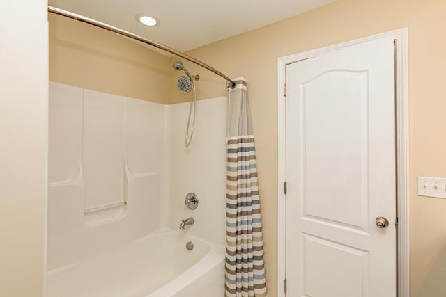 full bathroom featuring recessed lighting and shower / bath combination with curtain