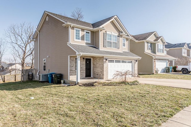 view of front of house featuring brick siding, fence, concrete driveway, a front yard, and an attached garage