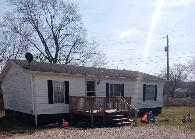 view of front of house with a deck