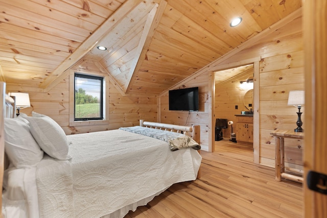 bedroom featuring wooden ceiling, wooden walls, wood finished floors, and lofted ceiling