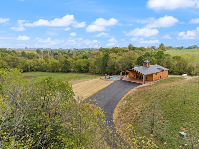 drone / aerial view with a forest view
