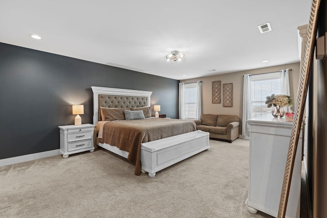 bedroom with recessed lighting, baseboards, visible vents, and light carpet