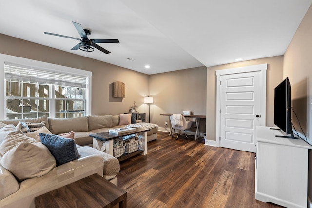 living area with dark wood finished floors, recessed lighting, a ceiling fan, and baseboards