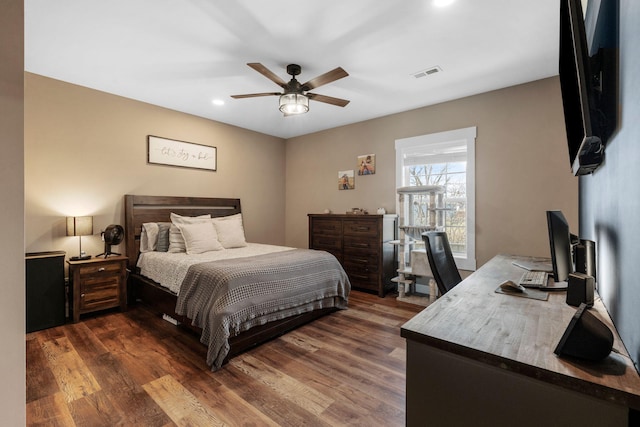 bedroom featuring visible vents, recessed lighting, a ceiling fan, and dark wood-style flooring