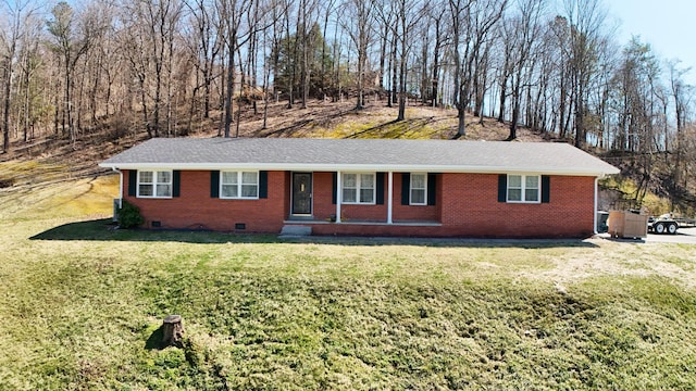 ranch-style home featuring crawl space, a front lawn, brick siding, and roof with shingles