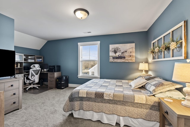 carpeted bedroom with visible vents, baseboards, and lofted ceiling