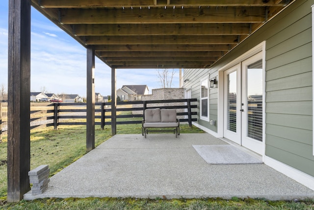 view of patio featuring fence