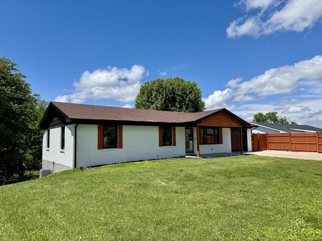 236 Walnut Ave, Somerset, KY 42503 - ranch-style house featuring brick siding, an attached garage, and driveway