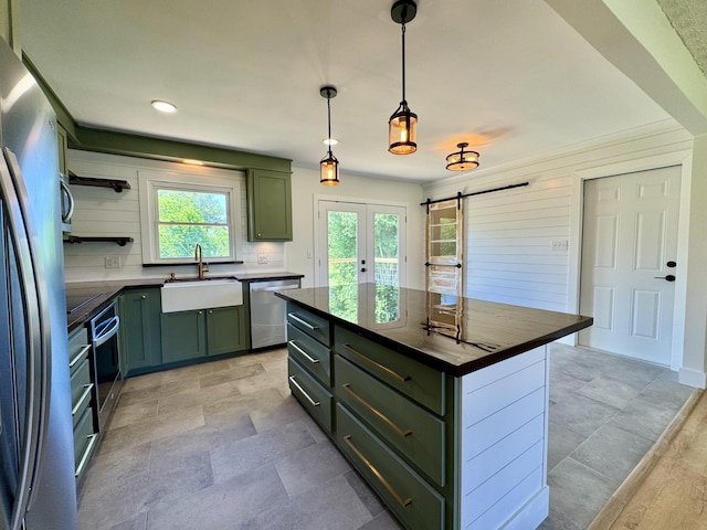 236 Walnut Ave, Somerset, KY 42503 - kitchen with green cabinets, appliances with stainless steel finishes, dark countertops, a sink, and recessed lighting