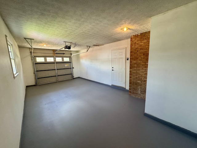 236 Walnut Ave, Somerset, KY 42503 - garage featuring baseboards and a garage door opener