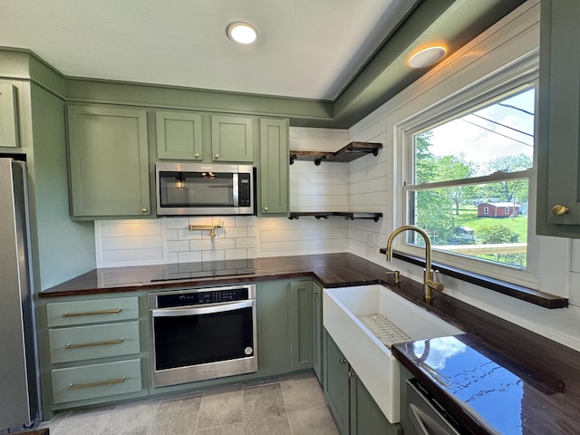 236 Walnut Ave, Somerset, KY 42503 - kitchen featuring green cabinets, appliances with stainless steel finishes, backsplash, and recessed lighting