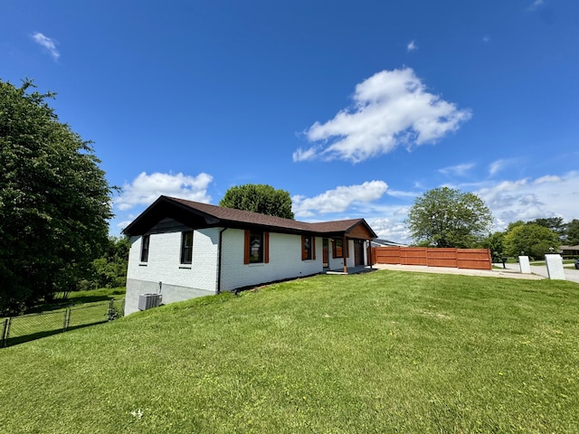 236 Walnut Ave, Somerset, KY 42503 - rear view of house with brick siding and central air condition unit