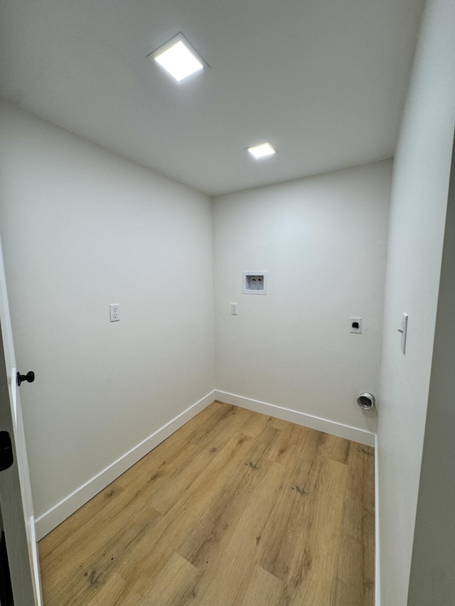 236 Walnut Ave, Somerset, KY 42503 - clothes washing area featuring electric dryer hookup, light wood finished floors, washer hookup, and baseboards