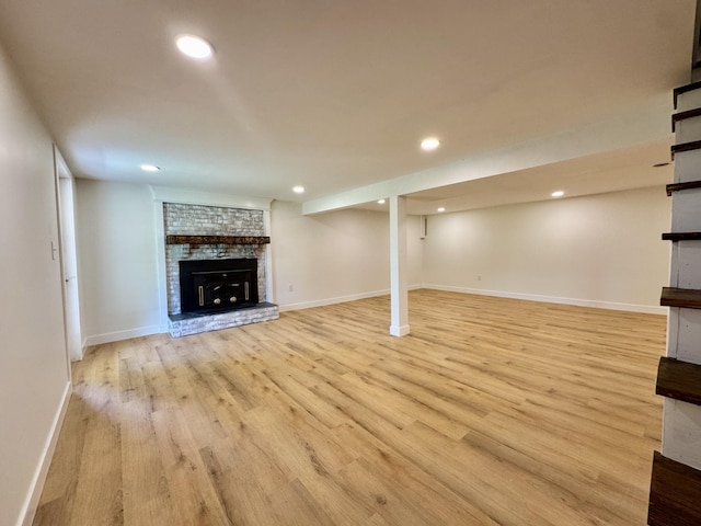 236 Walnut Ave, Somerset, KY 42503 - finished below grade area featuring a brick fireplace, light wood-style flooring, baseboards, and recessed lighting