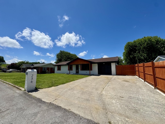 236 Walnut Ave, Somerset, KY 42503 - ranch-style home featuring an attached garage and driveway