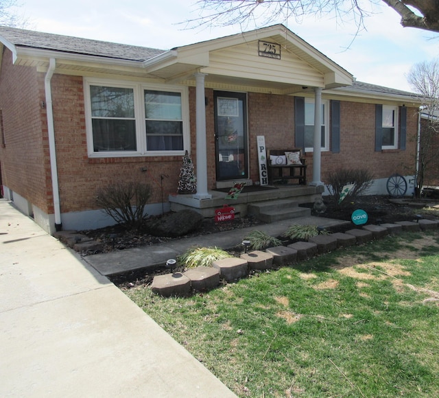 view of front of house with brick siding