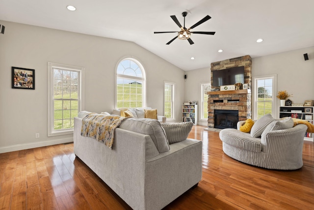 1841 Peter Cave Rd, Mckee, KY 40447 - living area featuring a ceiling fan, a fireplace, wood finished floors, lofted ceiling, and recessed lighting