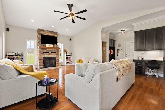 1841 Peter Cave Rd, Mckee, KY 40447 - living area featuring a fireplace, a ceiling fan, light wood-style floors, vaulted ceiling, and baseboards