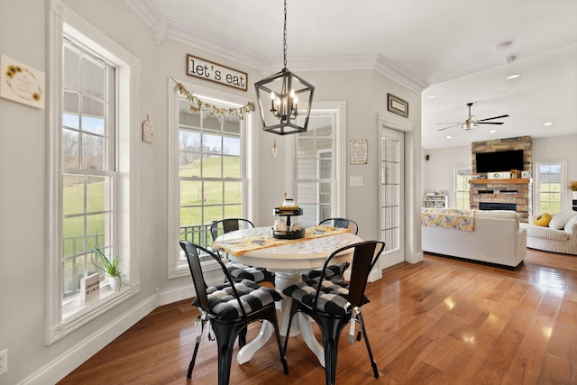 1841 Peter Cave Rd, Mckee, KY 40447 - dining room featuring a chandelier, a stone fireplace, baseboards, light wood-type flooring, and recessed lighting