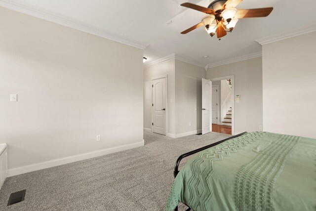 1841 Peter Cave Rd, Mckee, KY 40447 - carpeted bedroom featuring ornamental molding, baseboards, connected bathroom, and ceiling fan