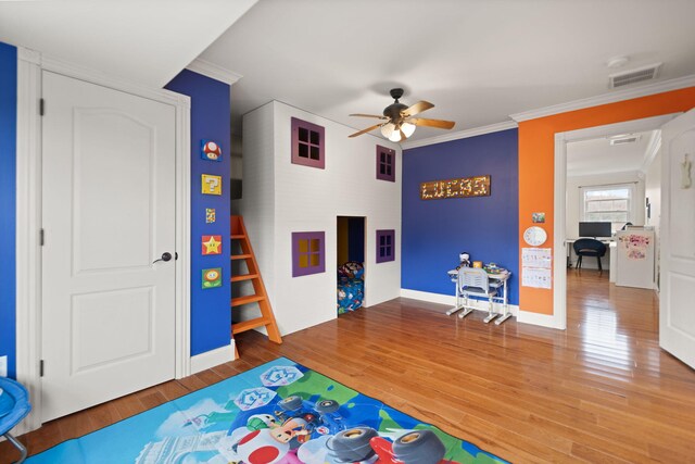 1841 Peter Cave Rd, Mckee, KY 40447 - playroom with a ceiling fan, wood finished floors, ornamental molding, and baseboards