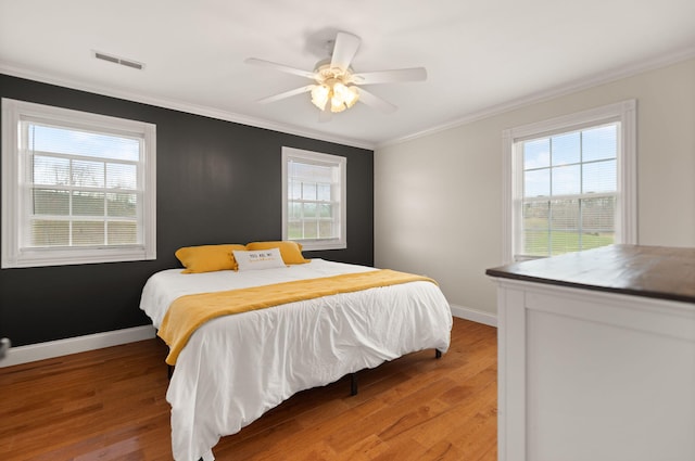 1841 Peter Cave Rd, Mckee, KY 40447 - bedroom with wood finished floors, crown molding, and ceiling fan