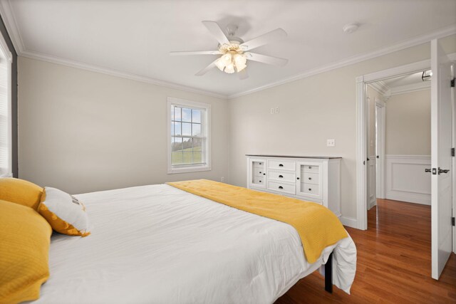 1841 Peter Cave Rd, Mckee, KY 40447 - bedroom with wood finished floors, crown molding, and ceiling fan