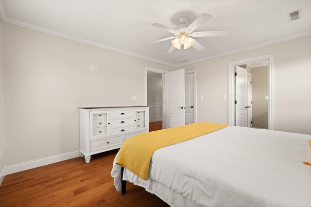 1841 Peter Cave Rd, Mckee, KY 40447 - bedroom with wood finished floors, ornamental molding, baseboards, and ceiling fan
