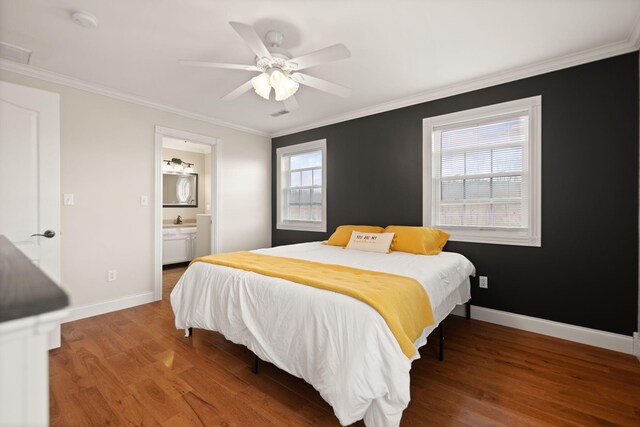 1841 Peter Cave Rd, Mckee, KY 40447 - bedroom with wood finished floors, ornamental molding, baseboards, a ceiling fan, and connected bathroom