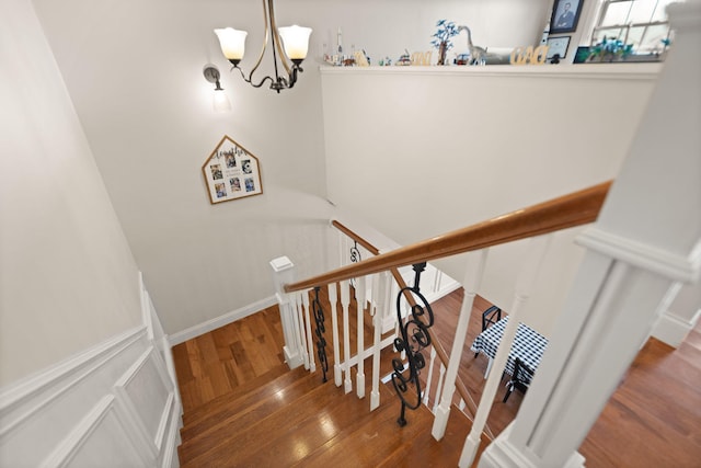 1841 Peter Cave Rd, Mckee, KY 40447 - stairs with wood finished floors and a chandelier