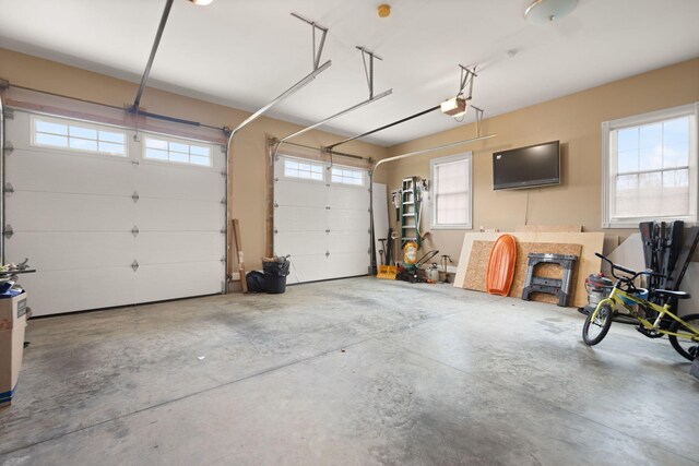 1841 Peter Cave Rd, Mckee, KY 40447 - garage featuring a garage door opener
