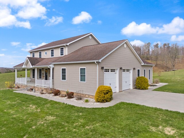 1841 Peter Cave Rd, Mckee, KY 40447 - view of side of home featuring covered porch, driveway, an attached garage, a yard, and roof with shingles