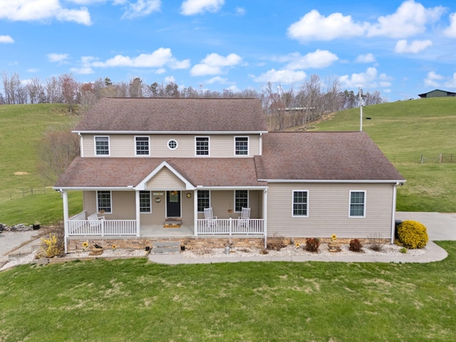 1841 Peter Cave Rd, Mckee, KY 40447 - view of front of home featuring covered porch and a front yard