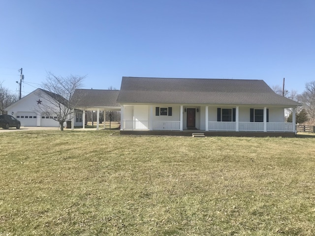 farmhouse inspired home with a porch and a front yard