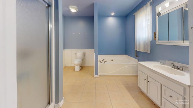 full bath featuring toilet, a stall shower, a bath, tile patterned floors, and vanity