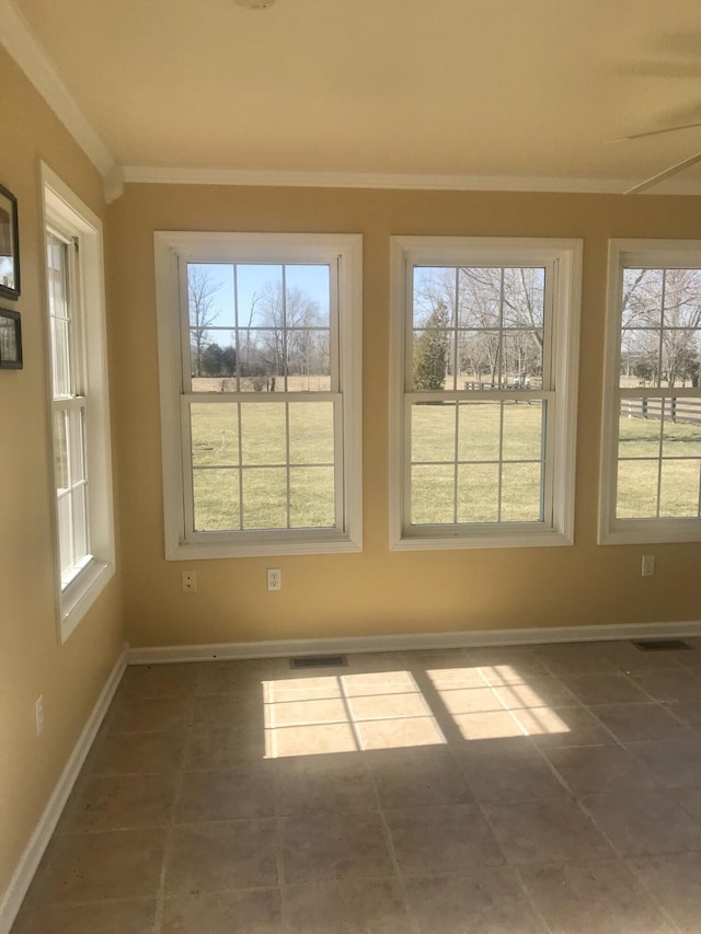 unfurnished sunroom featuring visible vents