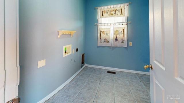 washroom featuring baseboards, laundry area, electric dryer hookup, tile patterned flooring, and washer hookup